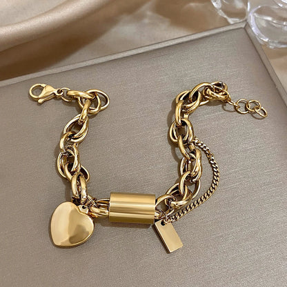 Gold Thick Chain Bracelet with Heart Pendant – Bold & Elegant Jewelry