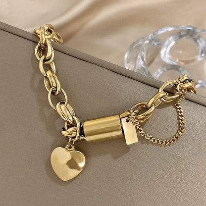 Gold Thick Chain Bracelet with Heart Pendant – Bold & Elegant Jewelry